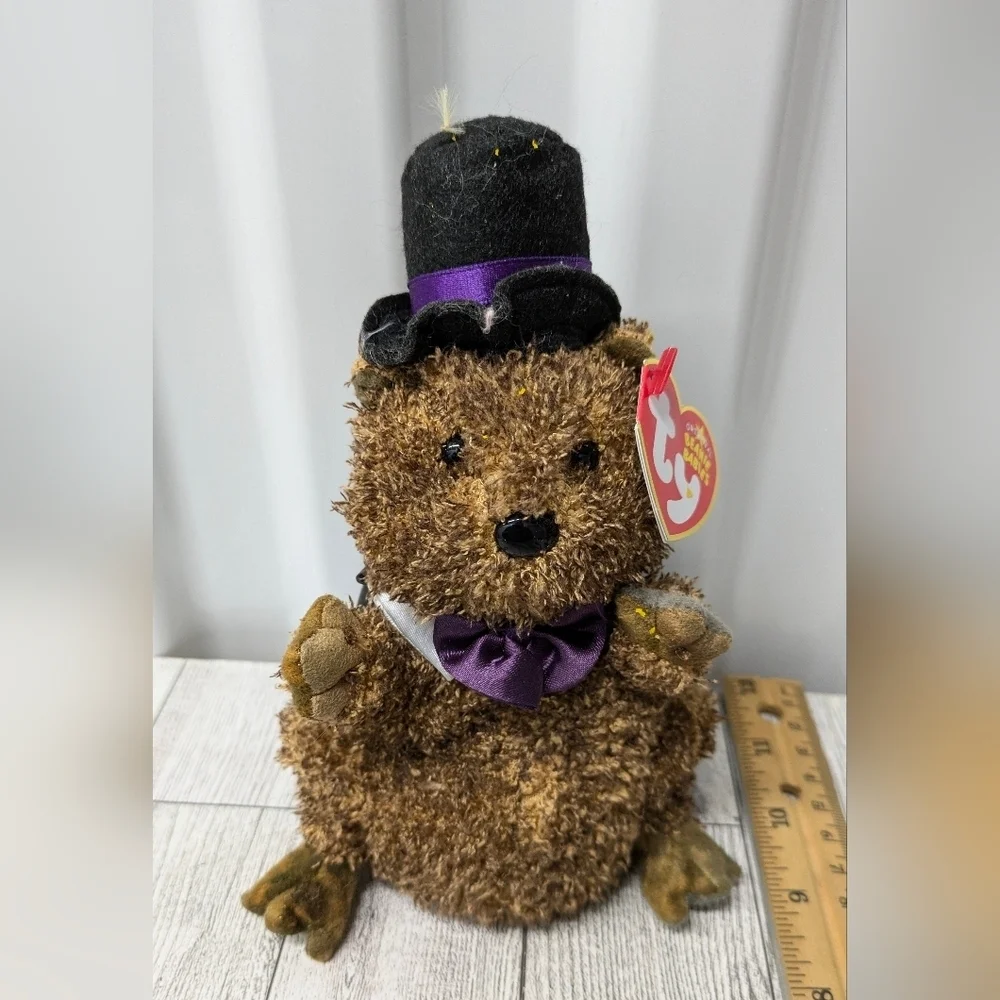 Ty Brown Stuffed Bear with Black Hat and Purple Bow